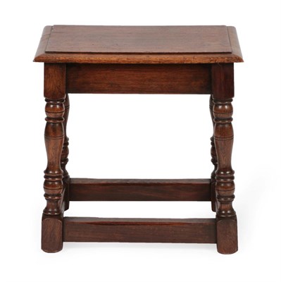 Lot 1683 - An Oak Joint Stool, in 17th century style, the moulded top above a plain frieze, on baluster turned