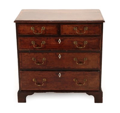 Lot 1684 - A George III Oak and Crossbanded Bachelor's Chest, circa 1780, with two short over three long...