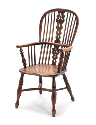 Lot 1685 - A Mid 19th Century Yewwood Double Spindle Back Armchair, Yorkshire/Cheshire region, with double...