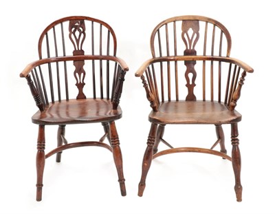 Lot 1686 - A Mid 19th Century Yew Wood Armchair, with double spindle back support and spindles, above...