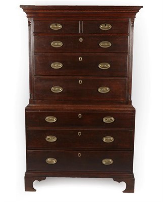 Lot 1690 - A George III Oak Chest on Chest, late 18th century, the bold cornice above a parquetry...