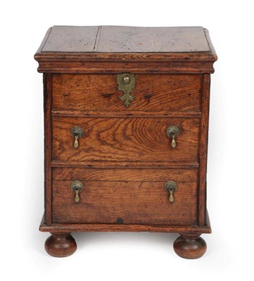 Lot 1691 - A 17th Century Ash Close Stool, the hinged lid above two dummy drawers, with brass carrying handles