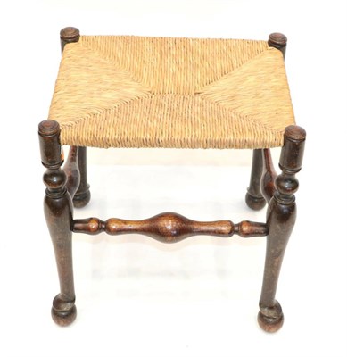 Lot 1694 - A Mid-19th Century Lancashire/Cheshire Ash and Rush Seated Stool, with turned legs joined by a...