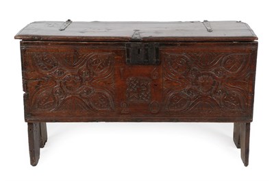 Lot 1698 - ~ A 17th Century Oak Boarded Chest, dated 1620, with hinged lid enclosing a paper lined...