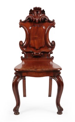 Lot 1701 - A Victorian Mahogany Hall Chair, mid 19th century, the scrolled back support above a vacant...