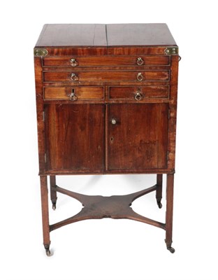 Lot 1705 - A George III Mahogany Washstand, late 18th century, the brass bound hinged lid enclosing a circular