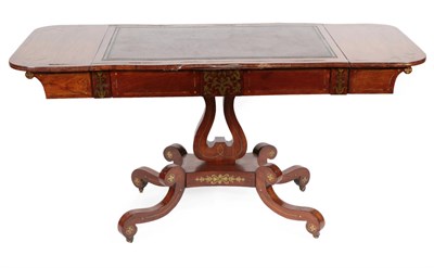 Lot 1710 - A Regency Rosewood and Brass Inlaid Sofa Table, early 19th century, with inset modern leather...