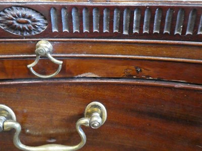 Lot 1712 - A George III Mahogany Serpentine Front Chest of Drawers, late 18th century, the fluted top...