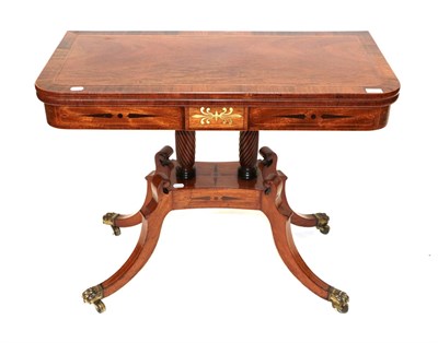 Lot 1714 - A Regency Mahogany, Rosewood Crossbanded and Ebony Strung Foldover Tea Table, early 19th...