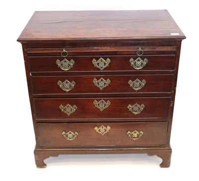 Lot 1723 - A George III Mahogany Bachelor's Chest, 3rd quarter 18th century, the pull-out brushing slide above