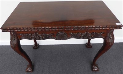 Lot 1724 - A Carved Mahogany Foldover Card Table, in George II Irish Style, late 19th century, the...