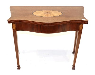 Lot 1730 - A George III Serpentine Shape Foldover Card Table, late 18th century, the hinged leaf, inlaid...