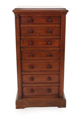 Lot 1742 - A Oak Wellington Chest, late 19th/early 20th century, the moulded top above seven drawers with...