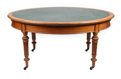 Lot 1762 - A Victorian Oak Library Table, 3rd quarter 19th century, of oval form with green leather...