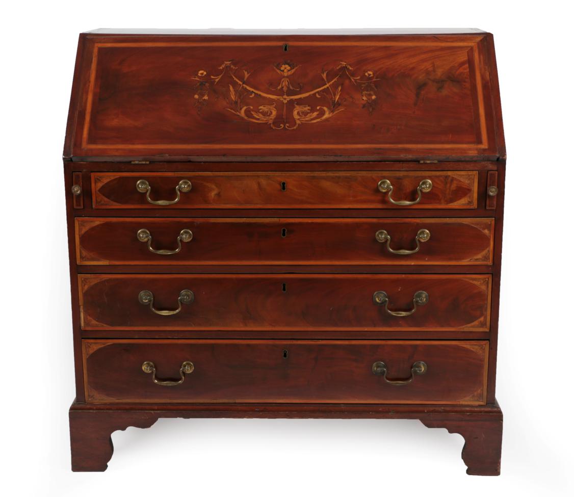 Lot 1763 - A Mahogany, Satinwood and Marquetry Inlaid Bureau, the fall front enclosing an attractive...