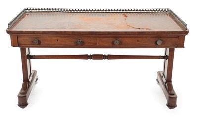 Lot 1773 - ~ An Early Victorian Mahogany Writing Table, mid 19th century, the pierced brass three-quarter...