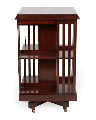Lot 1792 - An Edwardian Mahogany and Boxwood Strung Revolving Bookcase, the moulded top inlaid with...