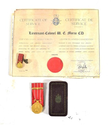 Lot 50 - A Canadian Forces Decoration (E.II.R.), with additional ten year service bar and miniature, awarded