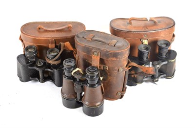 Lot 64 - Three Pairs of First World War British Binoculars:- prismatic x 6, by Dollond, London, marked...