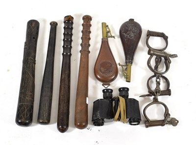 Lot 118 - A Small Quantity of Militaria, comprising:- two leather shot flasks, one embossed with a gillie...