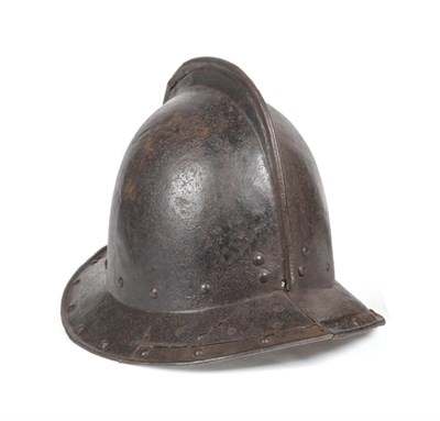 Lot 124 - A 17th Century Pikeman's Pot Helmet, circa 1640, of two piece construction with folded seam to...