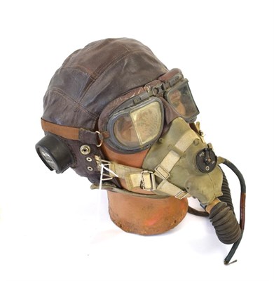 Lot 126 - A Second World War Leather Flying Helmet, C type, the bakelite ear pieces with Air Ministry...