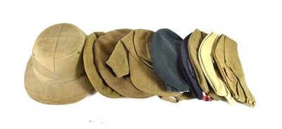 Lot 131 - A Collection of Ten Pieces of British Military Headgear, comprising a pith helmet by Cecil &...