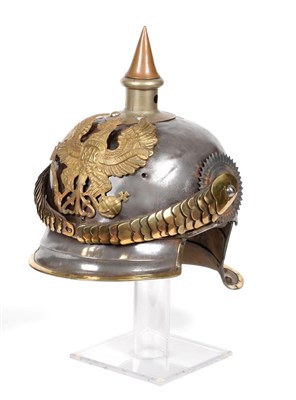Lot 134 - A Prussian Cuirassier's Steel Pickelhaube, the copper spike with nickel vented stem and...