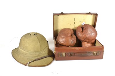 Lot 136 - A Second World War RAF Issue Wolseley Helmet, with six panelled crown, three fold puggaree with RAF