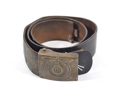 Lot 173 - A German Third Reich SS EM/NCO's Buckle, in stamped steel, bearing traces of silver wash, the...