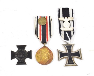 Lot 184 - An Imperial German Iron Cross, Second Class, with 1939 Spange, the medal of three piece...