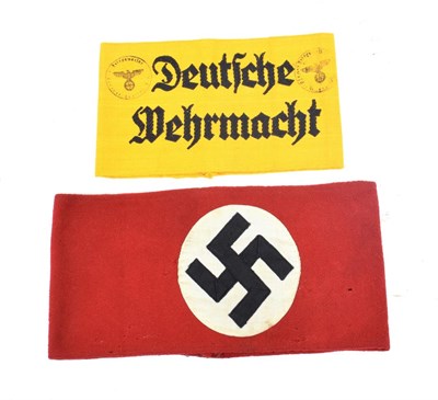 Lot 188 - A German Third Reich NSDAP Armband, in red wool applied with a black ribbed rayon ribbon...