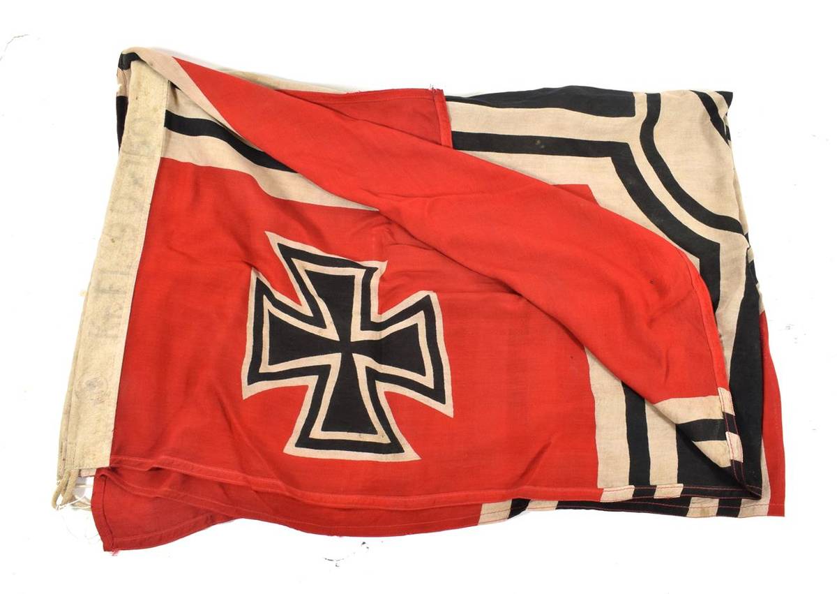 Lot 215 - A German Third Reich Battle Flag (Reichskriegsflagge), in printed cotton, the hoist stencilled with