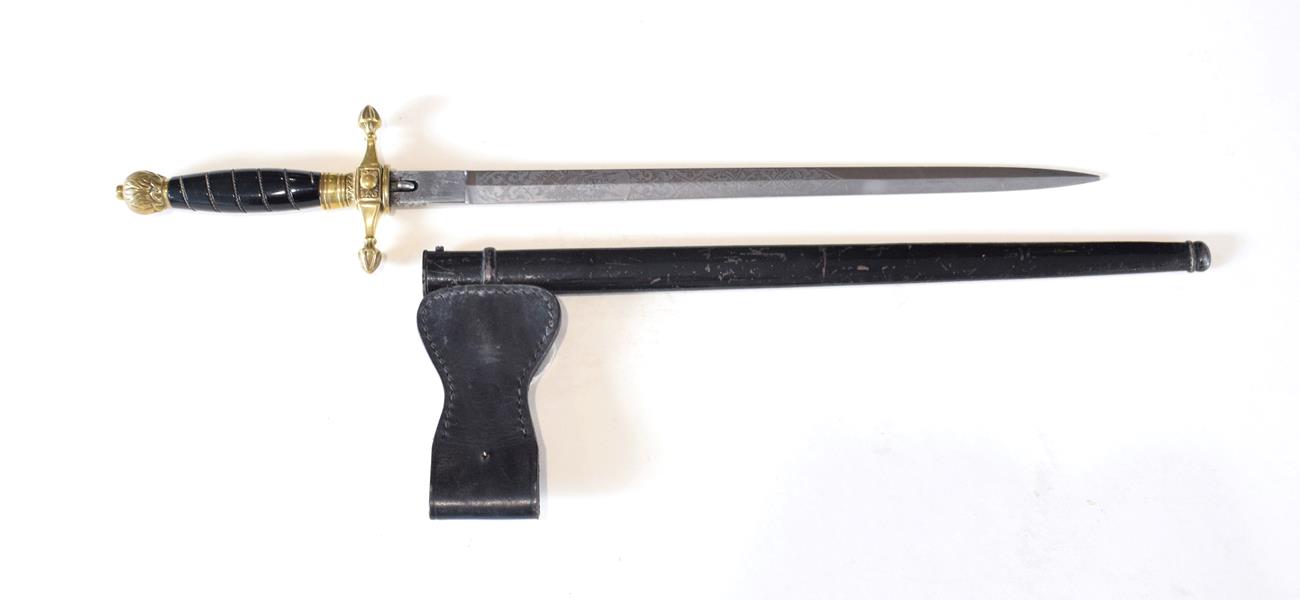 Lot 234 - A German Fire Official's Dagger, the 33.5cm double edge steel blade etched with martial...