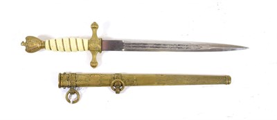 Lot 243 - A German Third Reich Naval Dirk, the 25cm double edge steel blade with two narrow fullers to...