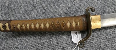 Lot 254 - A Japanese Shin-gunto Katana, the 67cm steel blade with tang bearing a signature and crescent shape