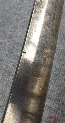 Lot 254 - A Japanese Shin-gunto Katana, the 67cm steel blade with tang bearing a signature and crescent shape