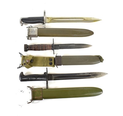 Lot 264 - Two US M1 Garand Knife Bayonets, one with 24.5cm blued steel blade, the other with 25cm steel...