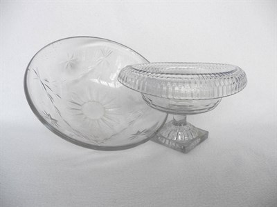 Lot 10 - An Irish Glass Oval Bowl, circa 1800, with fluted foldover rim on a plain stem and square lemon...