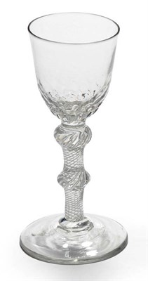 Lot 13 - A Wine Glass, circa 1750, the rounded funnel bowl with honeycomb moulding to the base, on...