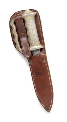 Lot 303 - A Second World War Australian and New Zealand Commando Knuckle Knife, with 15.5cm double edge...