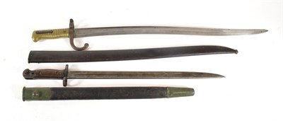 Lot 314 - A French M1866 Chassepot Yataghan Sword Bayonet, the T section steel blade faintly engraved...