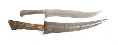 Lot 318 - A 19th Century Arab Khanjar, the 24cm double edge curved steel blade with raised medial ridge,...