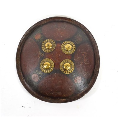 Lot 344 - A 19th Century Indian Leather Dhal, of convex circular form, with dished and folded rim,...