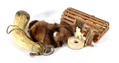 Lot 348 - A Collection of Newfoundland and Labrador Artefacts, comprising walrus tusk carved as an Inuit...