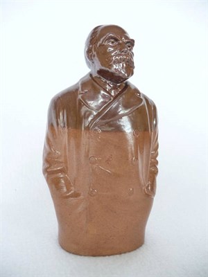Lot 21 - A Doulton Lambeth Brown Saltglaze Stoneware Gin Flask, modelled as John Burns, circa 1909, the...
