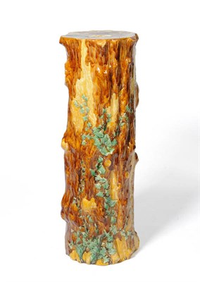 Lot 23 - An English Majolica Stand as a Tree Trunk, circa 1880, of naturalistic form with ivy picked out...