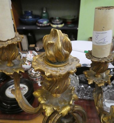 Lot 8 - A pair of gilt cherub candelabras; together with glassware and wooden stands