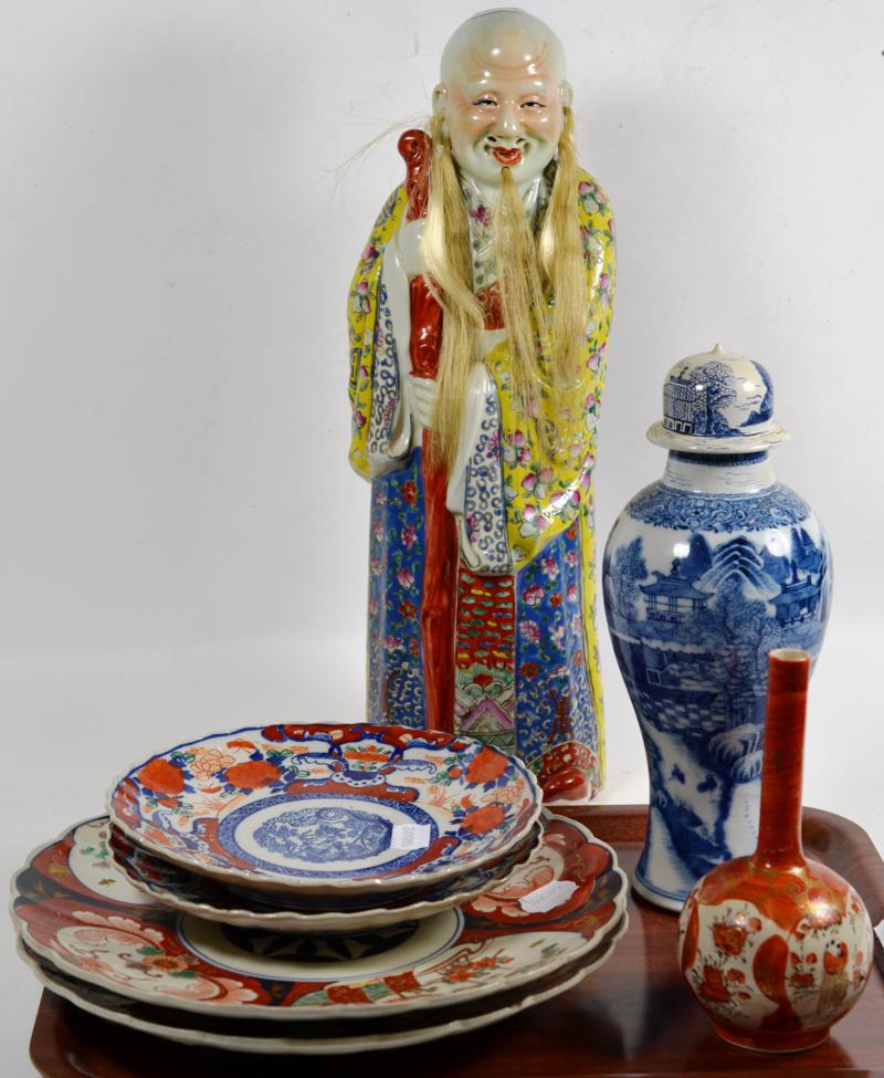 Lot 9 - Two pairs of Japanese Imari plates; a Kutani bottle vase; and a Chinese porcelain figure etc