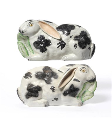 Lot 25 - A Rare Pair of Staffordshire Pottery Rabbits, circa 1870, each recumbent with black spotted...